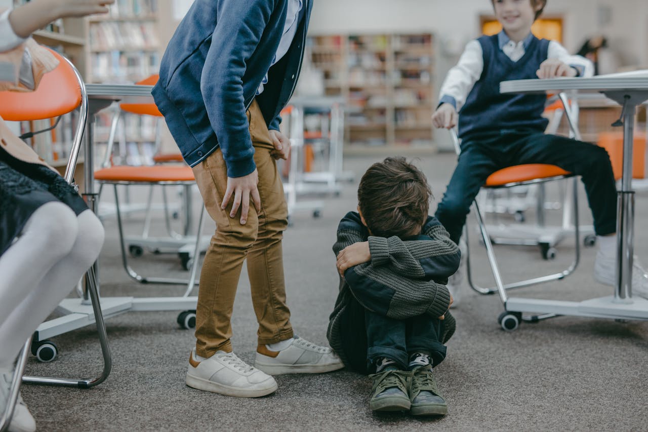 Student Helping Crying Classmate